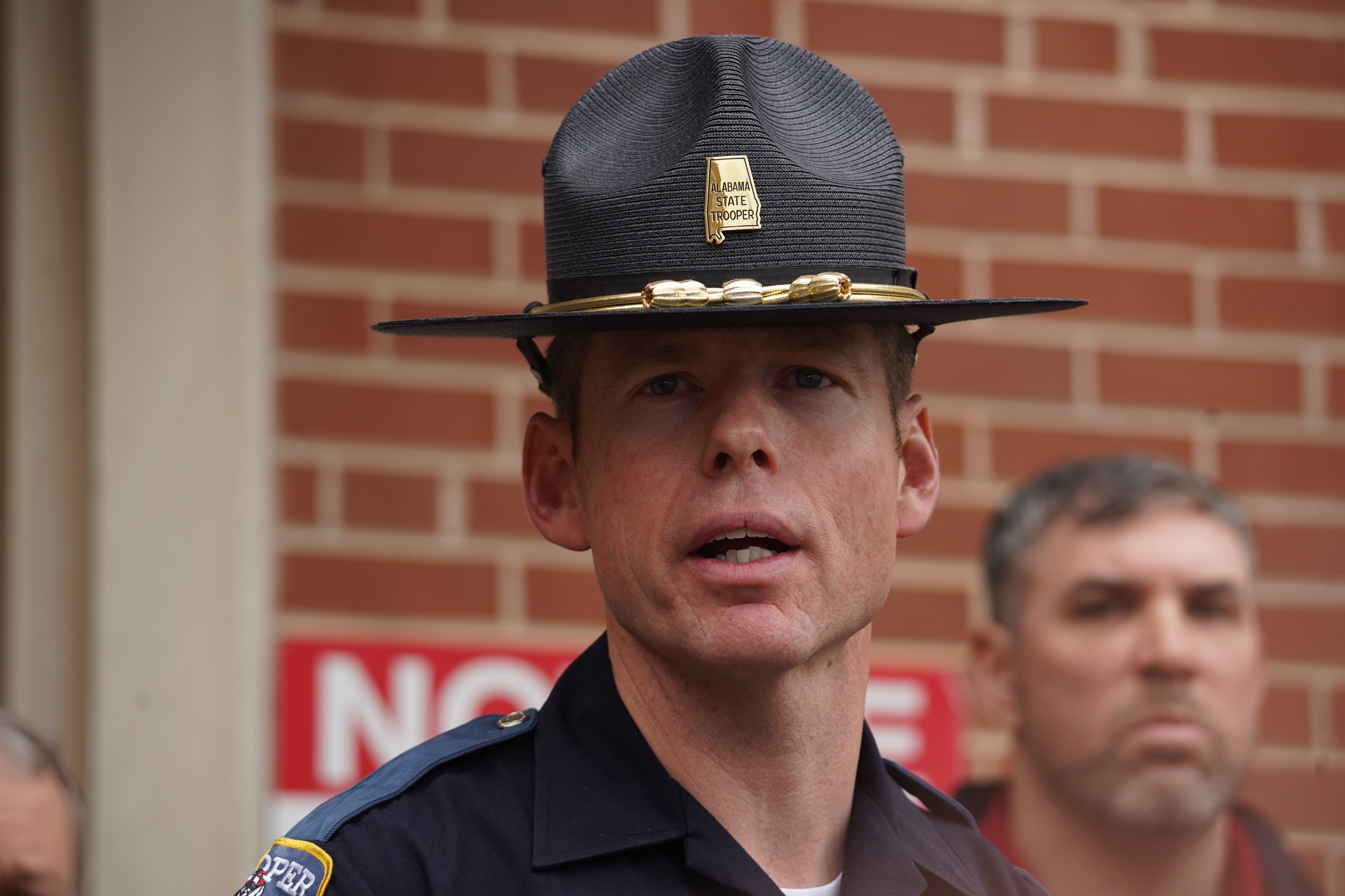 <p>Sergeant Jeremy Burkett speaks at a press conference (16 April 2023)  </p>