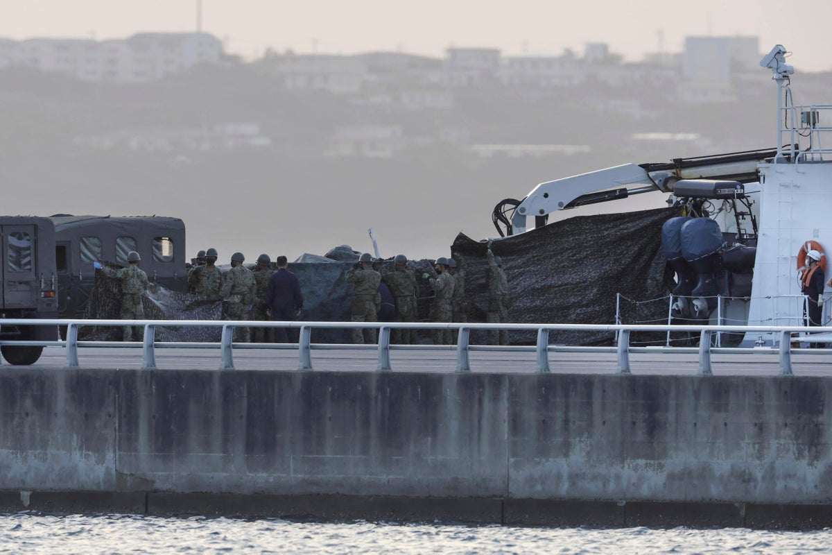 2 bodies lifted from sea after Japan army helicopter crash