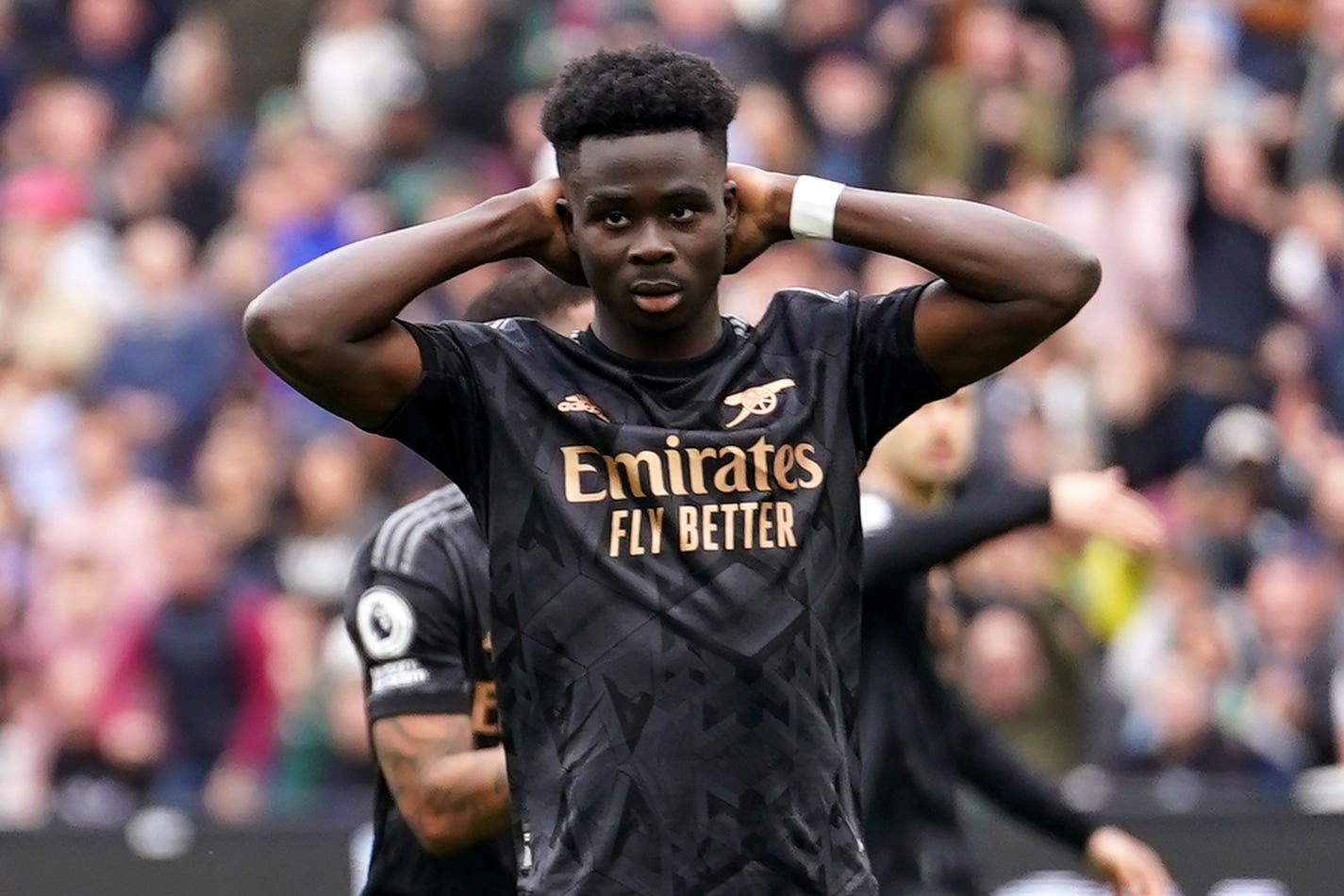 Arsenal’s Bukayo Saka reacts after missing a penalty during his side’s 2-2 draw with West Ham (Adam Davy/PA)