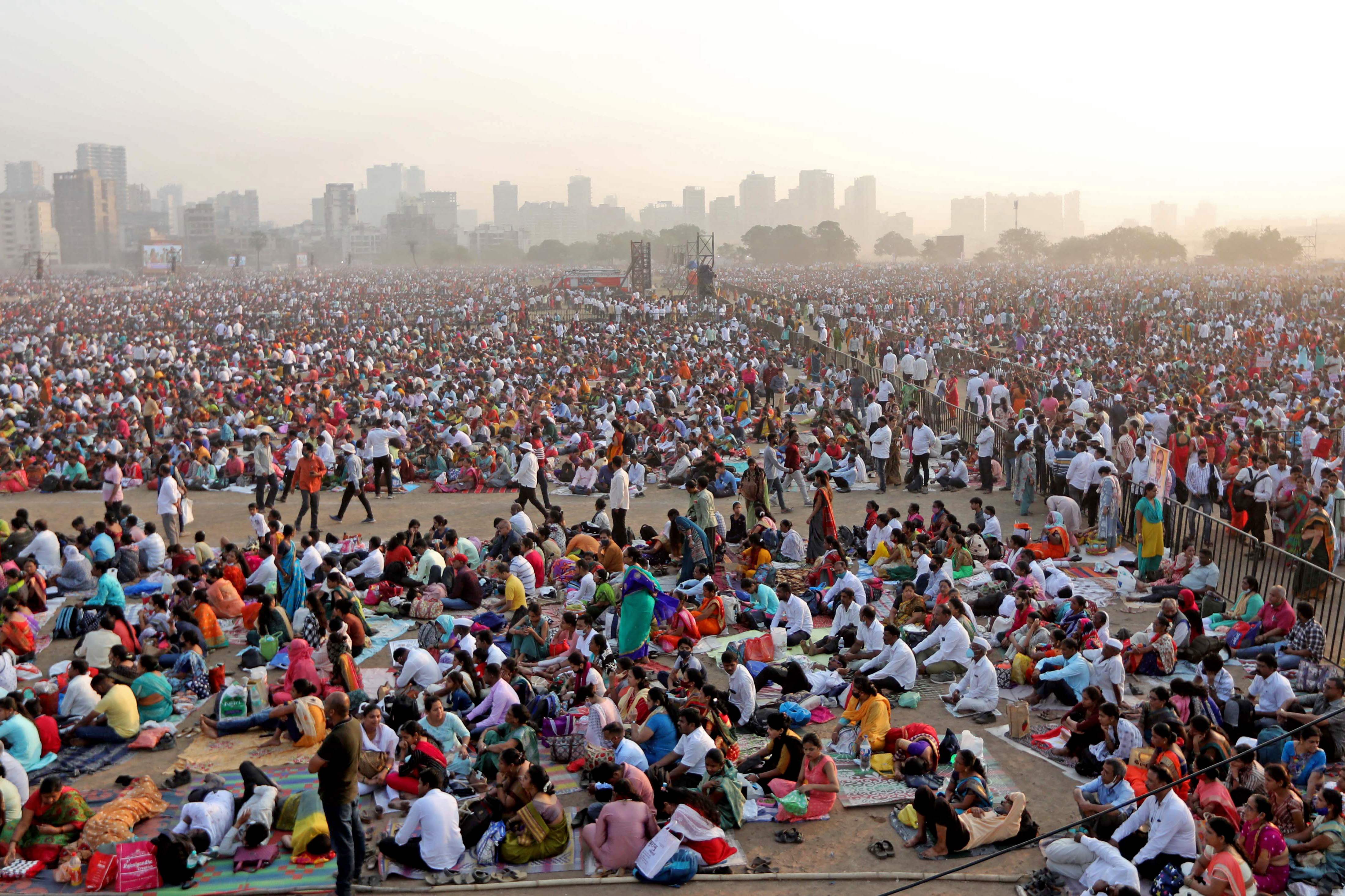 In this photo taken on 16 April, people gather to attend an award ceremony on the outskirts of Mumbai