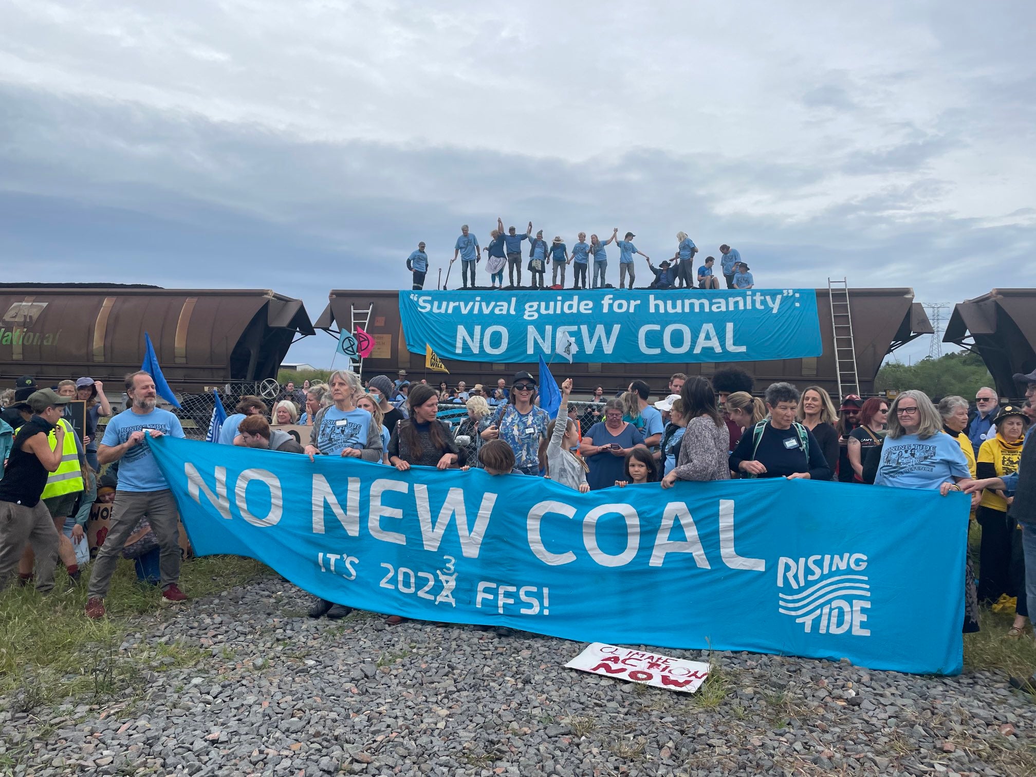 Climate activists involved in the protest halt train and shoveled coal out of its wagons