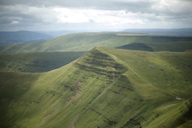the summit of Cribyn mountain as seen from Pen y Fan, in Brecon Beacons National Park, Wales, as the national Park is changing its name as a direct response to the climate and ecological crisis, the park’s chief executive Catherine Mealing-Jones has said (Yui Mok/PA)