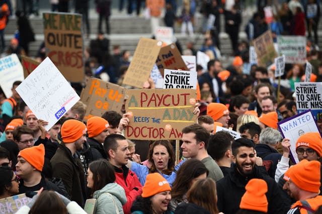<p>People take part in a rally in Trafalgar Square in London in support of striking NHS junior doctors, as the British Medical Association holds a 96-hour walkout in a dispute over pay</p>