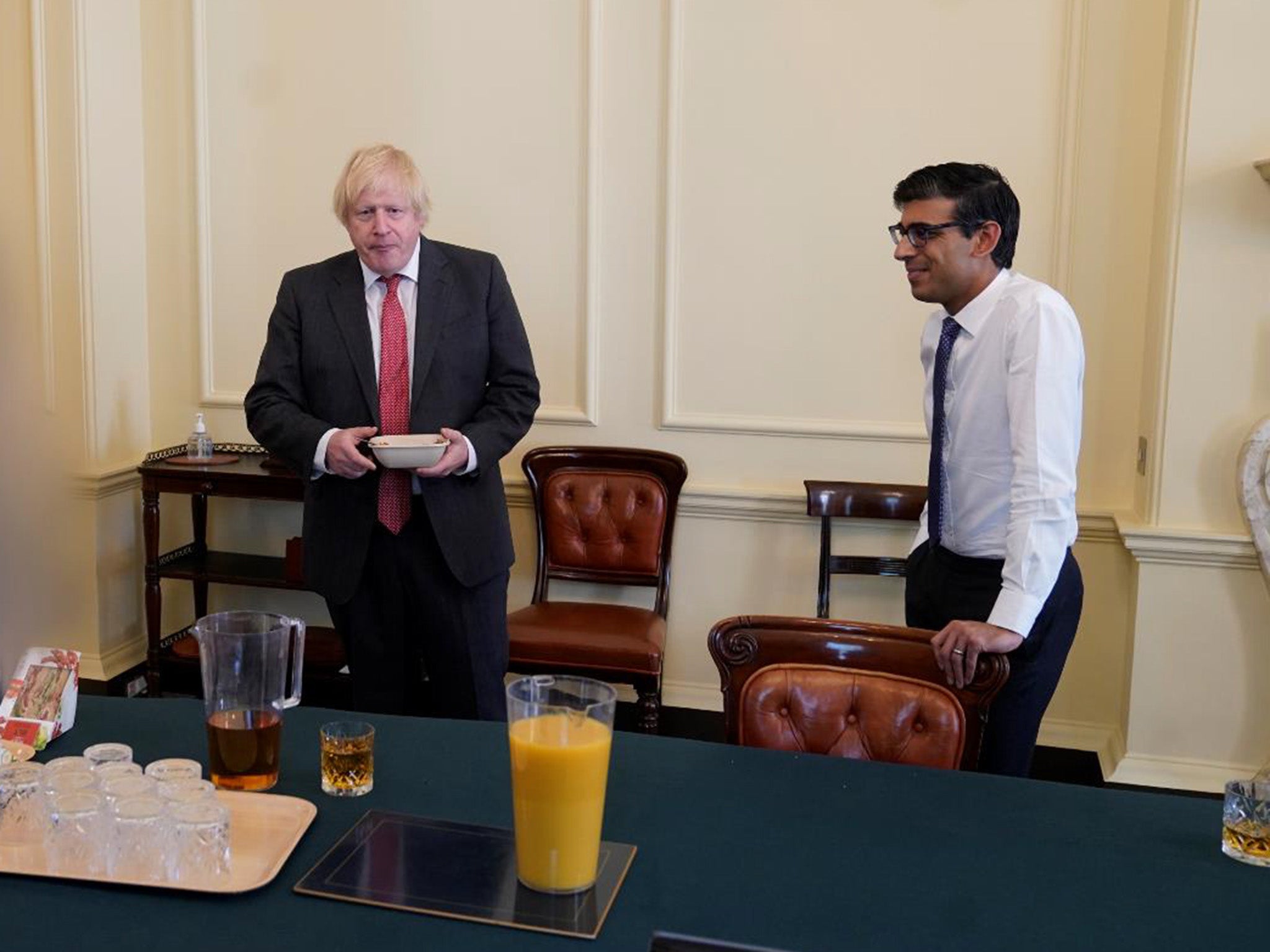 The then prime minister Boris Johnson (left), with then chancellor of the exchequer Rishi Sunak, at a gathering in the Cabinet Room in 10 Downing Street on his birthday, which was released with the publication of Sue's Gray report into Downing Street parties in Whitehall during the coronavirus lockdown
