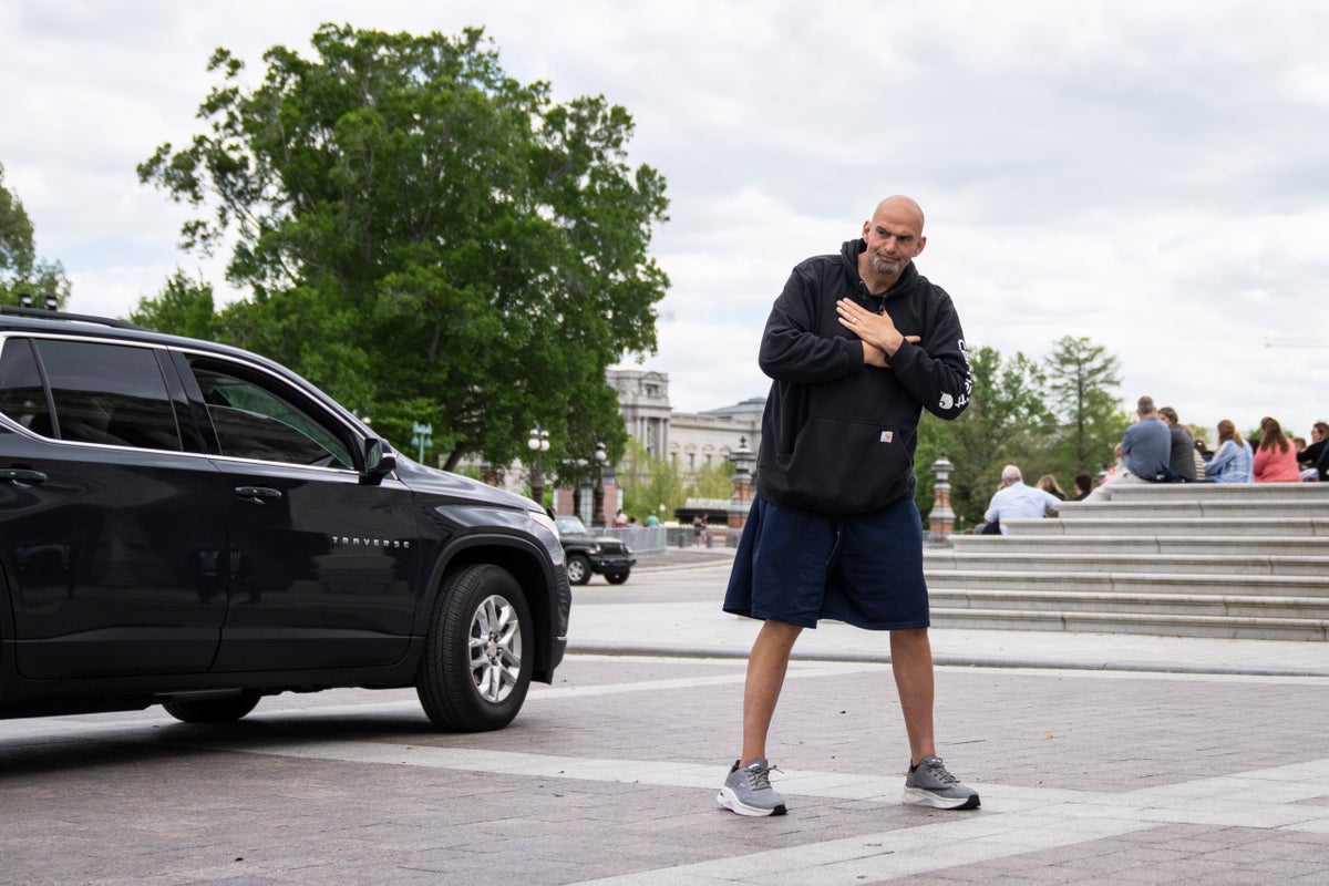 John Fetterman puts hands over heart as he returns to Senate after six-week hospitalization for depression