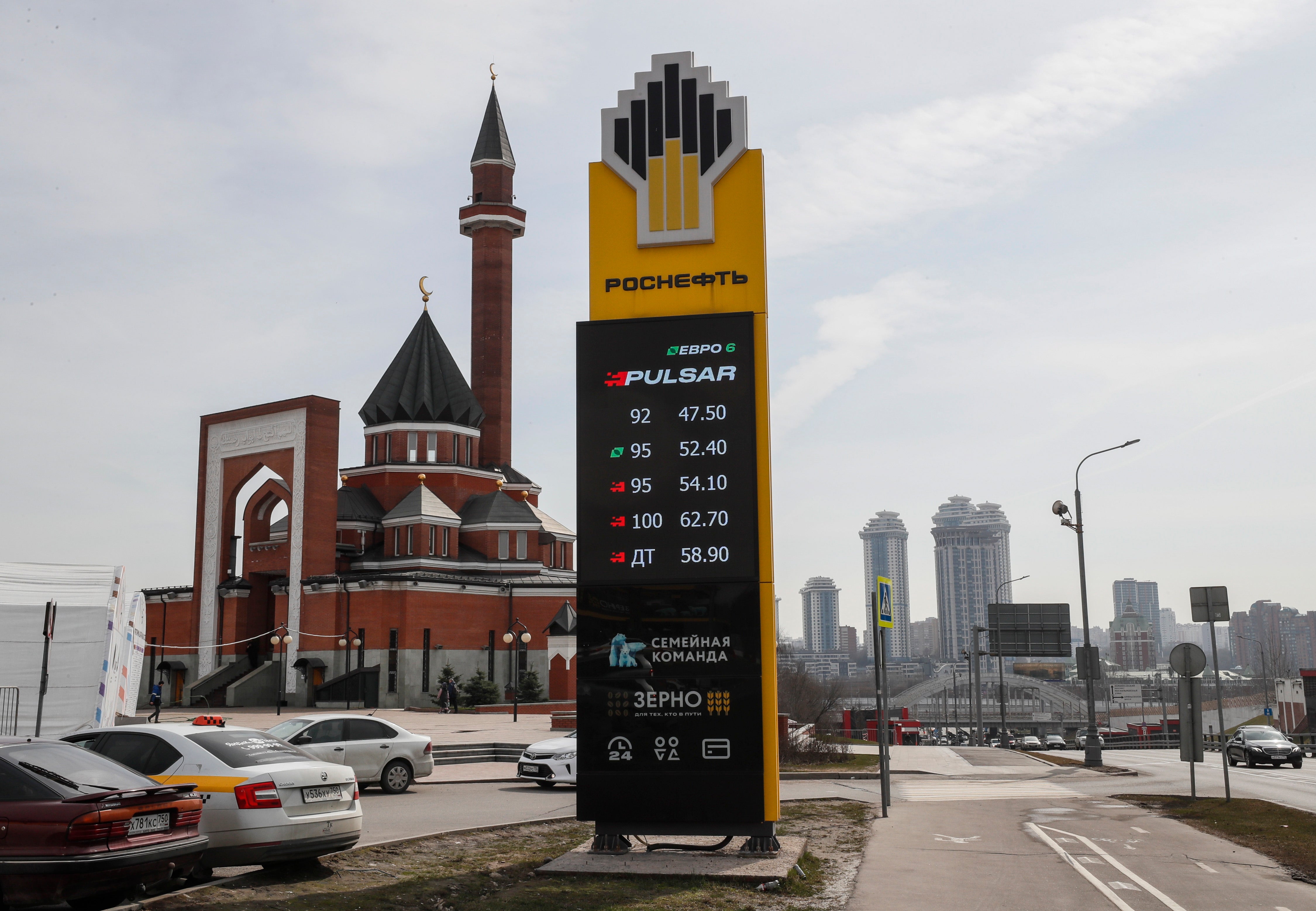 A brand logo at a gas station of Russian integrated energy company PJSC Rosneft, one of the largest Russian oil producing companies, in front of Mosque in Moscow