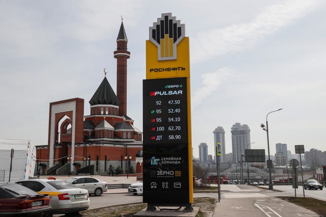 <p> A brand logo at a gas station of Russian integrated energy company PJSC Rosneft, one of the largest Russian oil producing companies, in front of Mosque in Moscow</p>