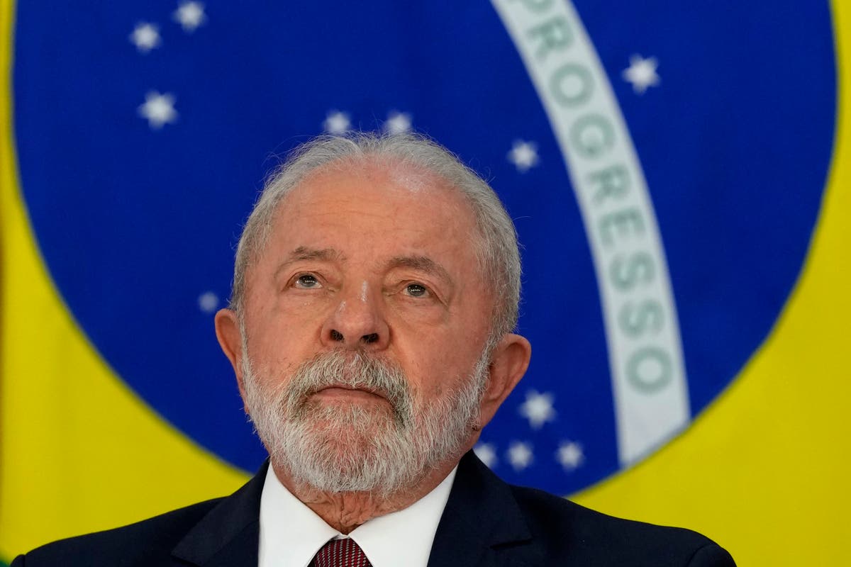 Brazil's Lula loses 1st minister after images during riot | The Independent