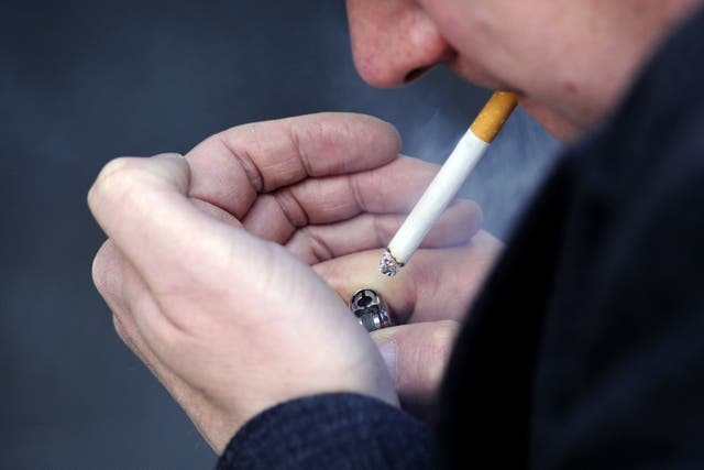 “Meagre” public spending on tobacco control measures should be propped up by a “polluter pays” tax on tobacco firms, a group of health experts has said (PA)