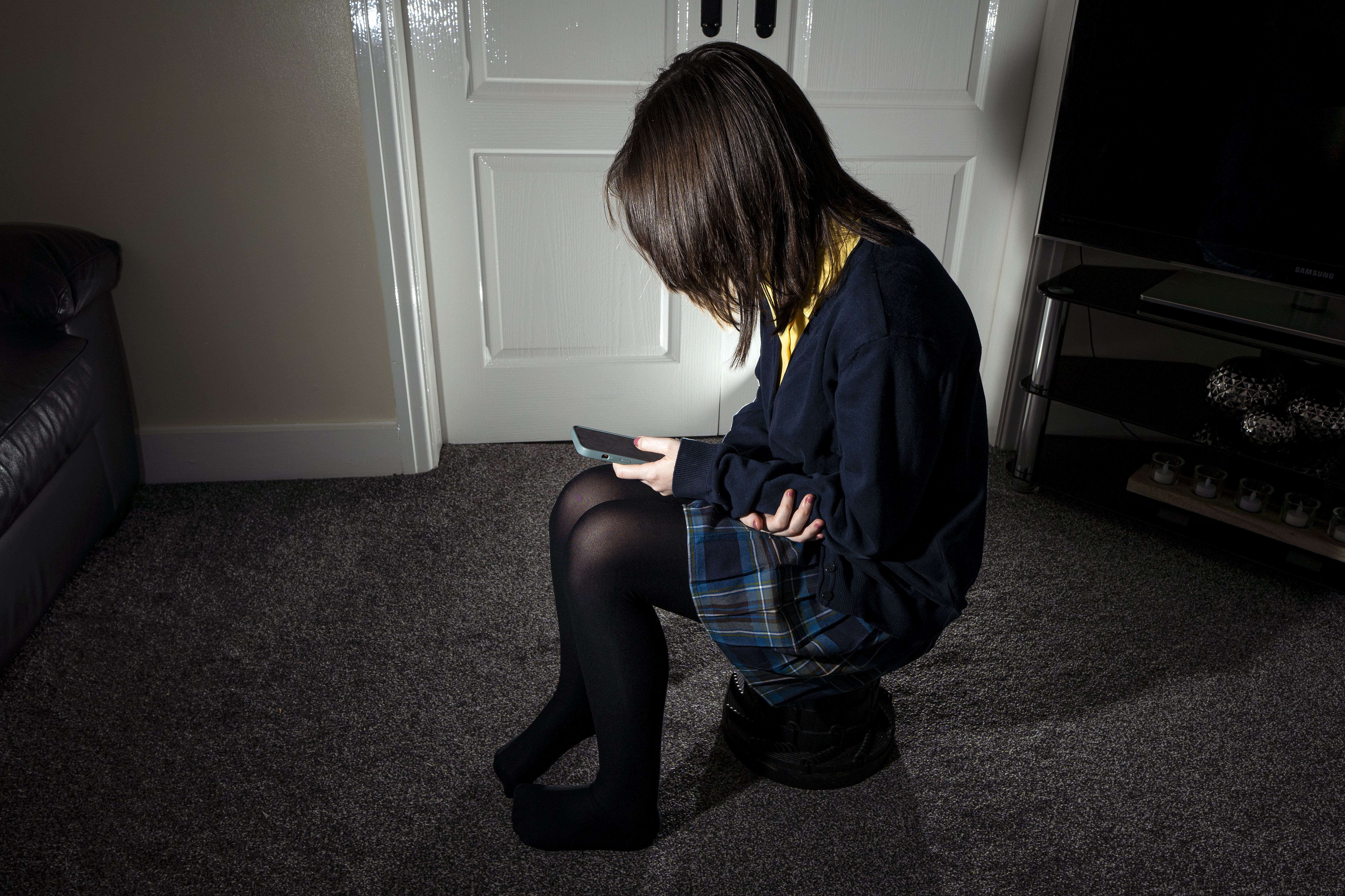 Campaigners are calling for the inclusion of a specific code of practice to be added to the Online Safety Bill to ensure social media companies respond to and prevent online violence against women and girls (Peter Byrne/PA)