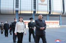 Kim Jong-un takes daughter on space agency visit and orders launch of spy satellite