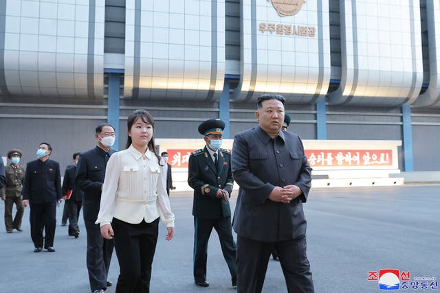 <p>North Korean leader Kim Jong-un and his daughter inspecting the National Aerospace Development Administration  </p>