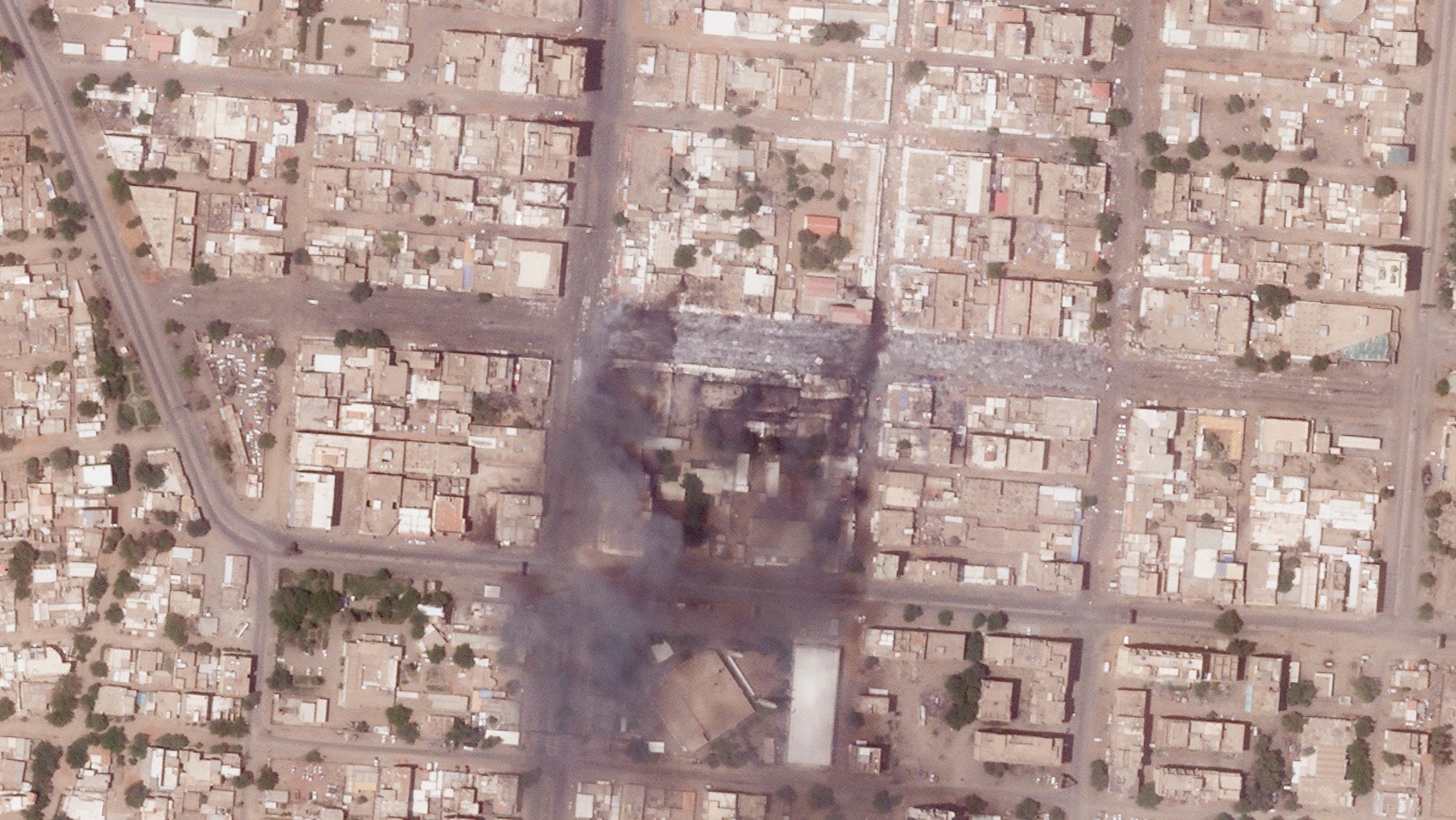 Destroyed market stalls in a commercial area of northern Khartoum