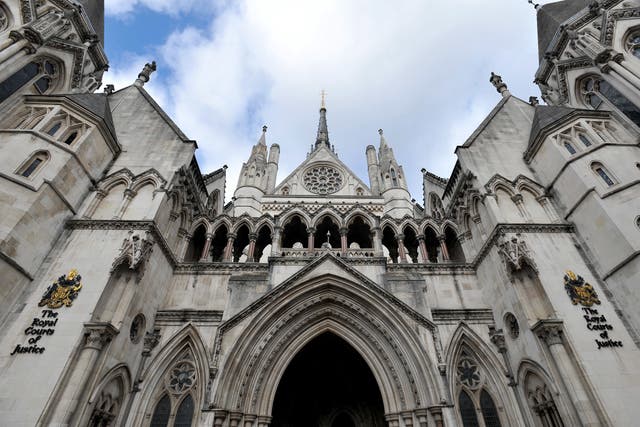 The Afghan woman’s legal challenge was heard at the High Court in London (Nick Ansell/PA)