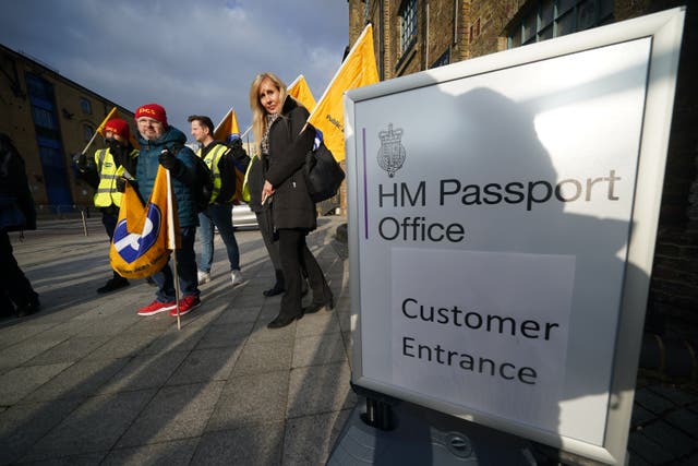 Members of the Public and Commercial Services Union on the picket line outside the Passport Office in east London (Yui Mok/PA)