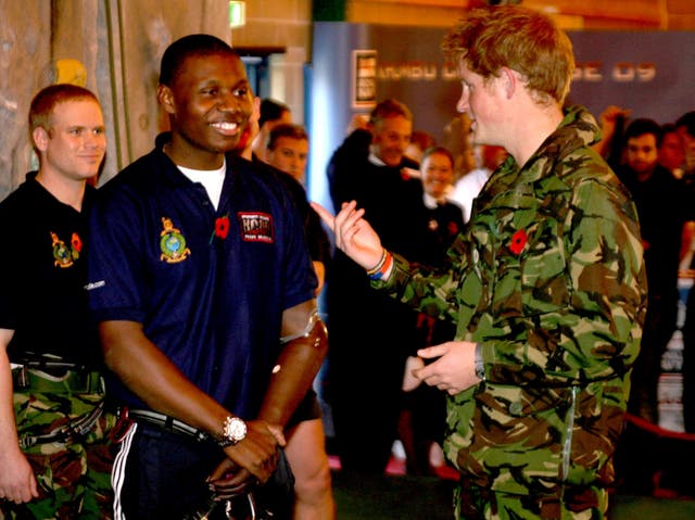 <p>Prince Harry with Royal Marine Ben McBean at HM Naval Base Devonport, Plymouth </p>