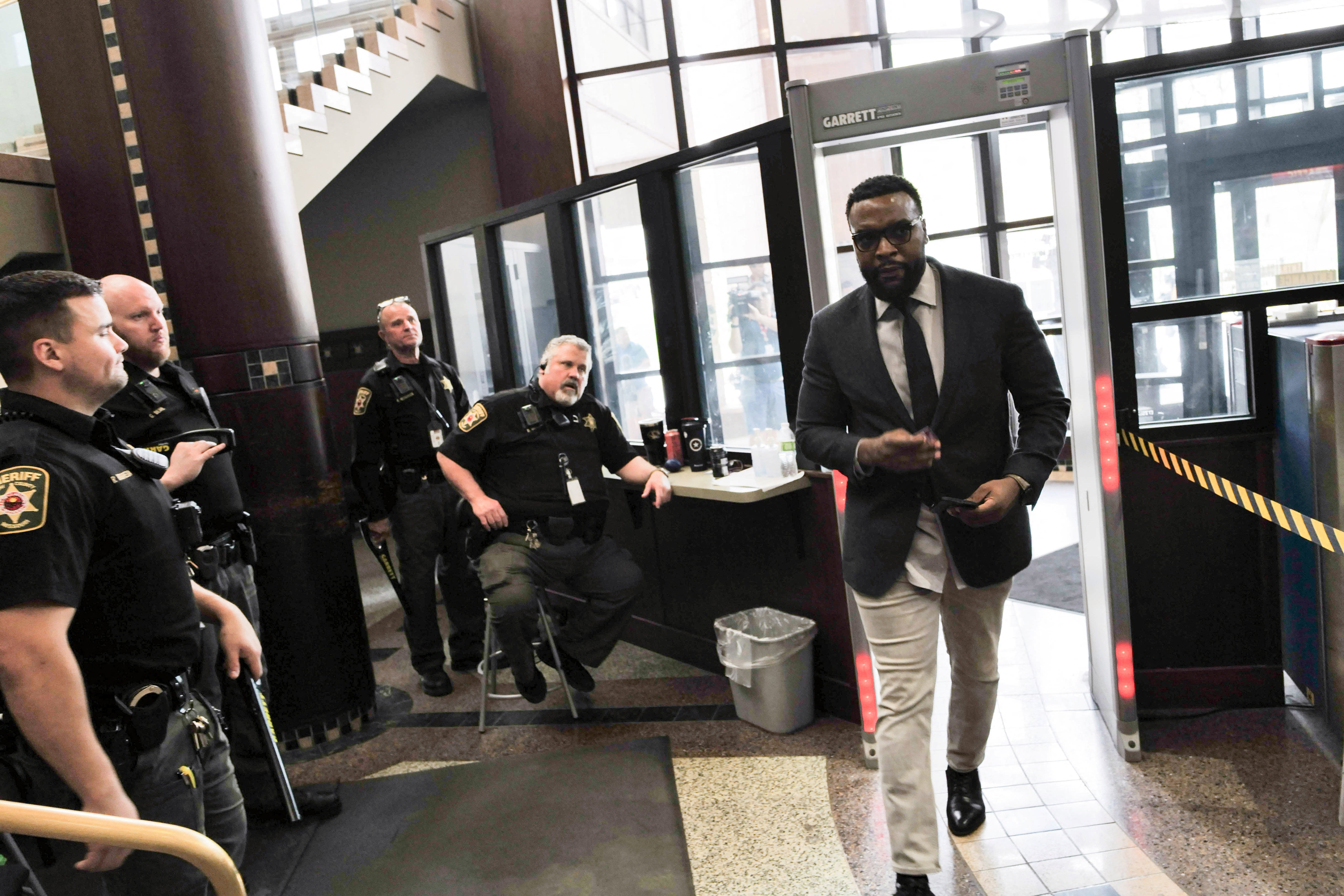Lee Merritt, lawyer for the family of Ralph Yarl, arrives for the initial court appearance of Andrew Lester, who was charged in the shooting of 16-year-old Yarl, in Clay County Court on April 19, 2023.