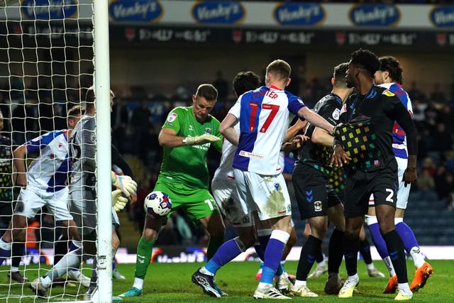 Coventry goalkeeper Ben Wilson scored a late goal against Blackburn in the Championship (Martin Rickett/PA)