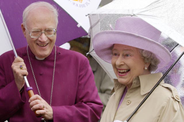 The Queen with the then-Archbishop of Canterbury, Doctor George Carey, pictured during her Golden Jubilee (PA)