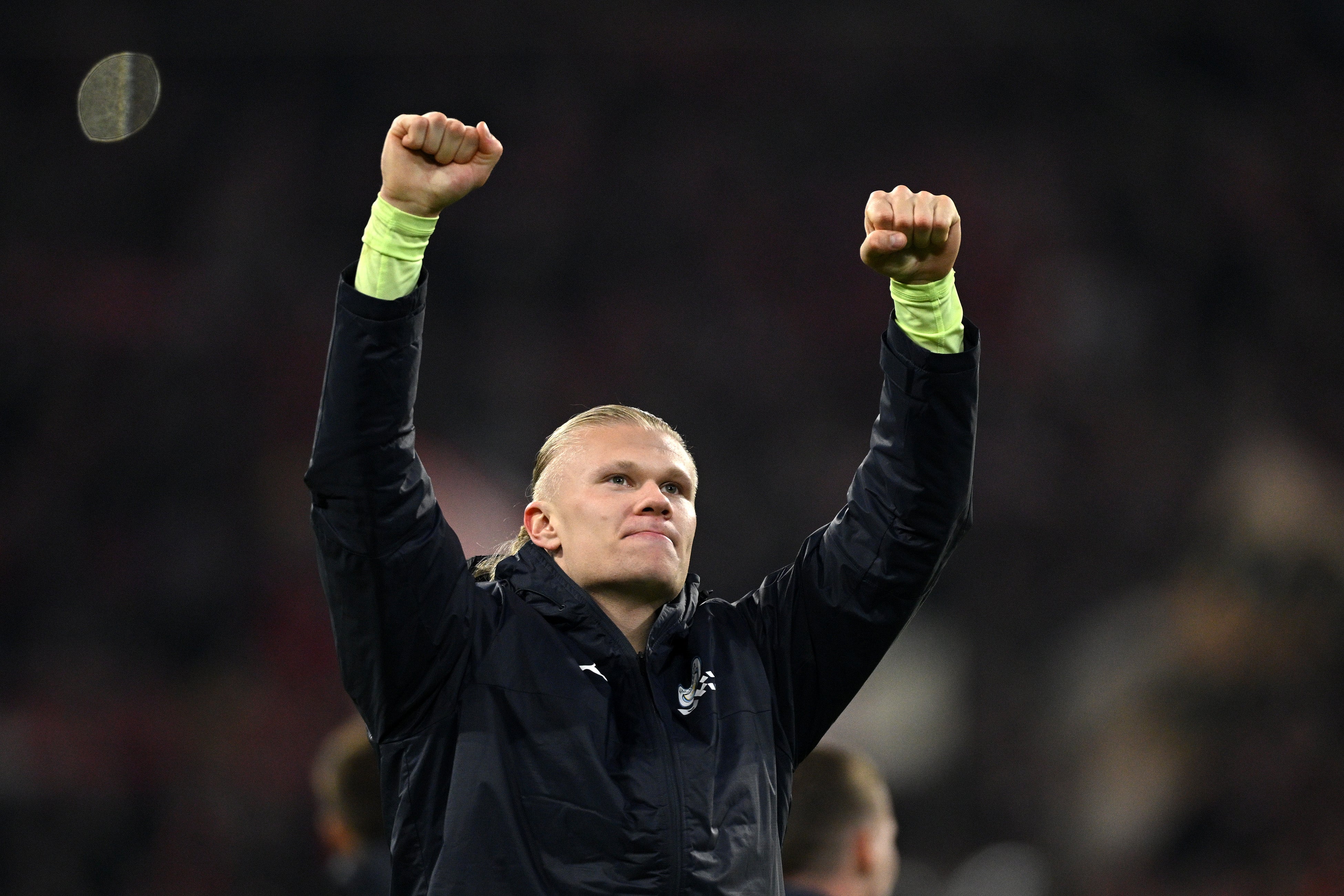 Erling Haaland salutes the Man City fans after beating Bayern Munich