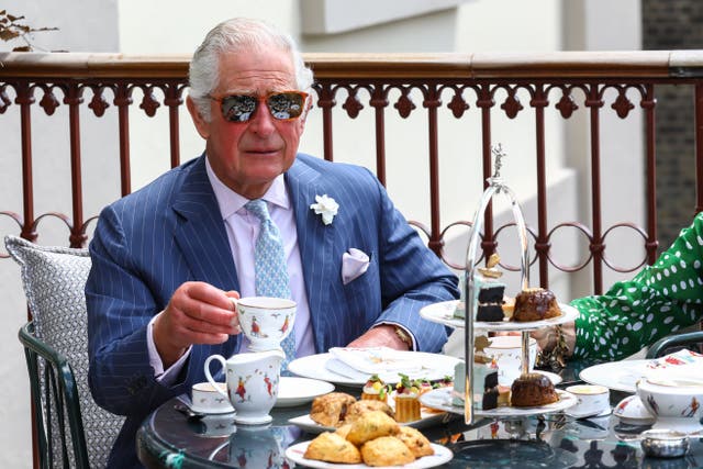 <p>Charles, then-Prince of Wales had tea on the terrace during a visit to Theatre Royal on June 23, 2021</p>