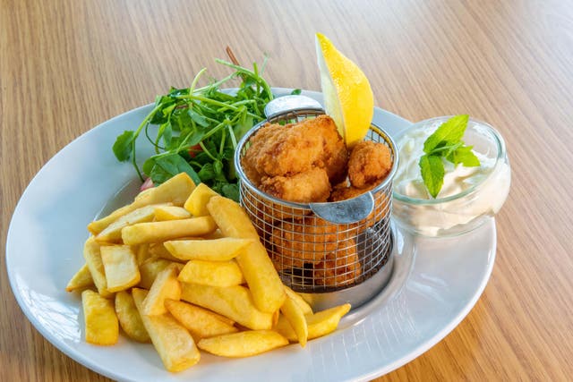 The former minister warned the traditional pub food of scampi and chips could be at risk (Alamy/PA)