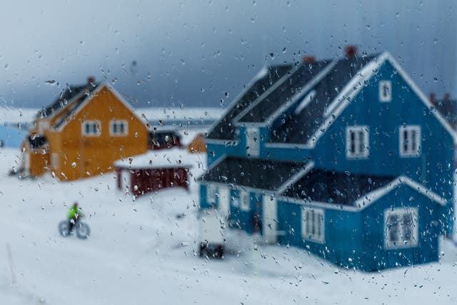 <p>Raindrops are seen on a window as a weather front carrying warmer air and rain approaches Ny-Aalesund</p>