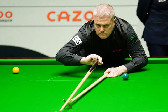 Robert Milkins booked his place in the last 16 at the Crucible (Mike Egerton/PA)