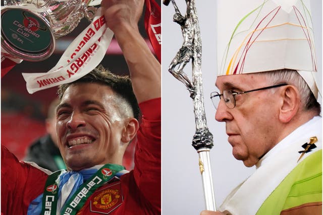 Lisandro Martinez, left, and Manchester United made a gift to Pope Francis (Owen Humphreys/Danny Lawson/PA)