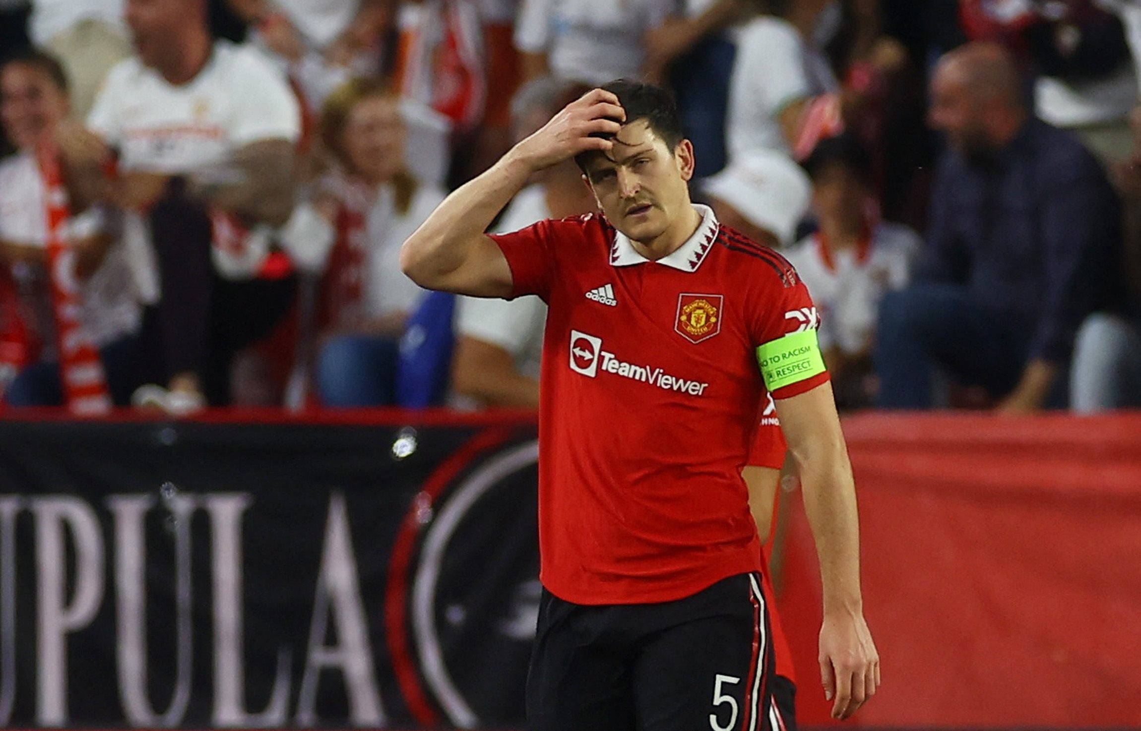 Harry Maguire reacts as Manchester United went behind