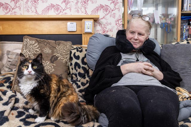 Amanda Jameson with her pet cat Willow (James Speakman/PA)