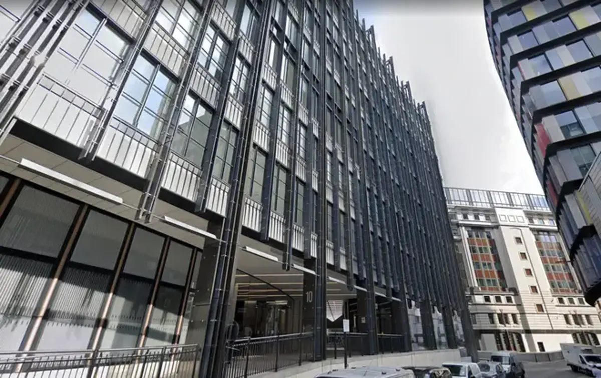 Man dies after becoming ‘trapped under machinery’ in office building