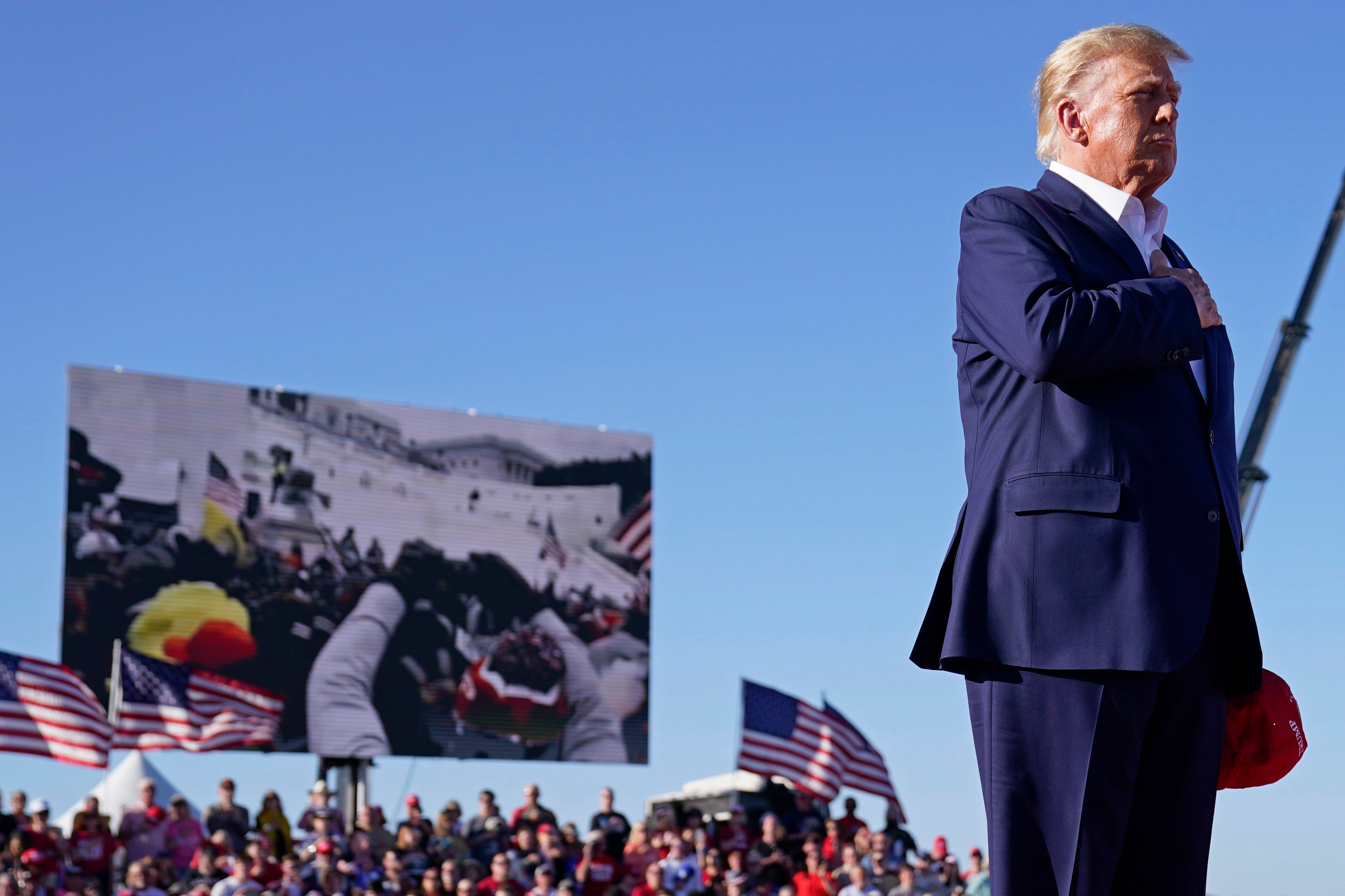 Donald Trump plays footage of January 6 at a recent campaign rally