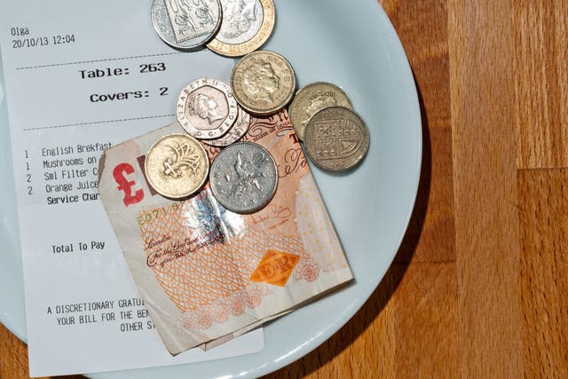 A new Bill would introduce a legal obligation on employers to ensure all tips, gratuities and service charges are paid to workers in full (Alamy/PA)