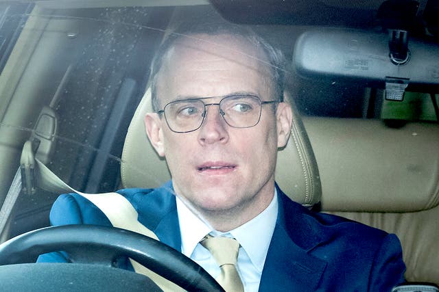 <p>Dominic Raab leaving his home on Friday following his resignation </p>