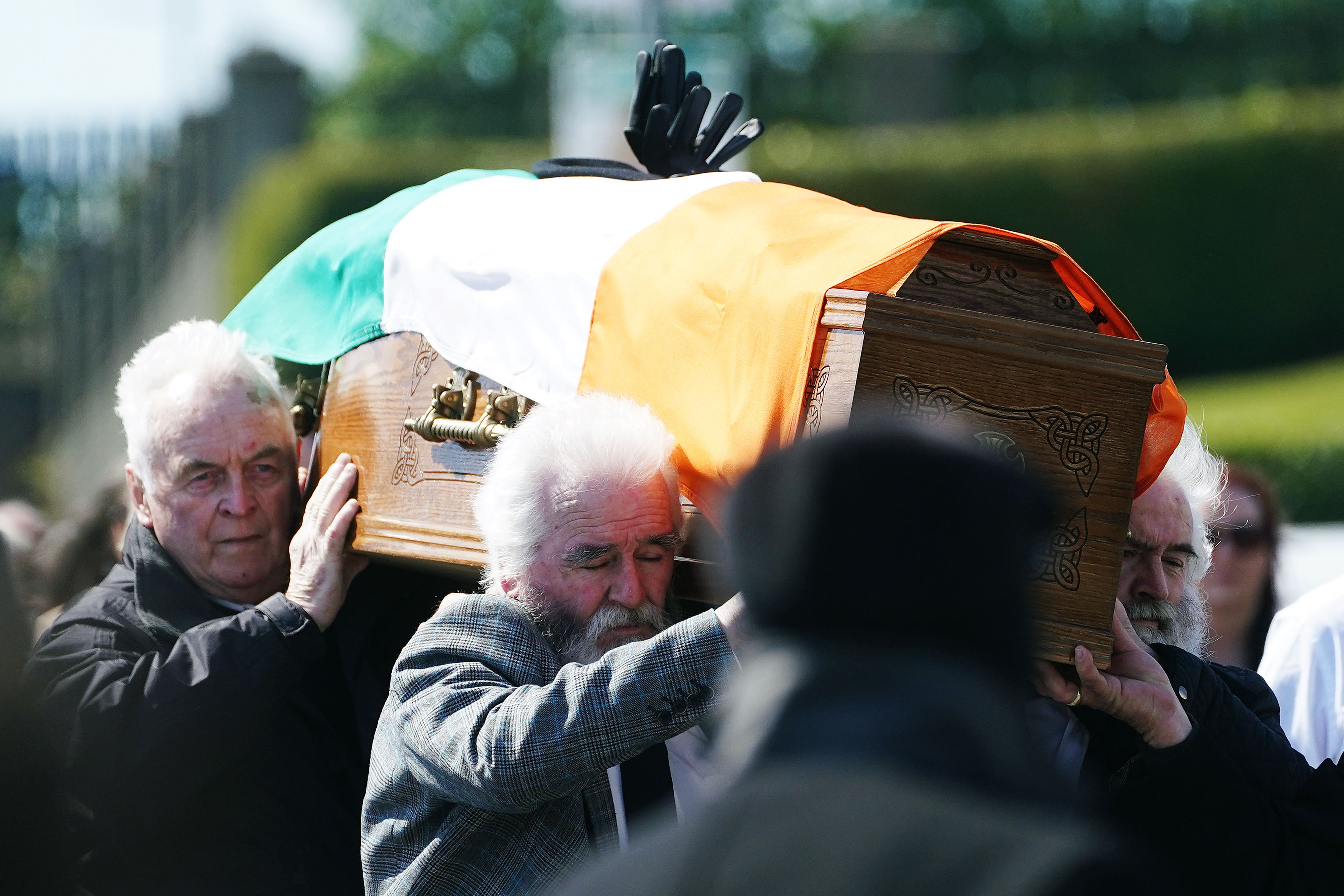 The coffin of Colm Murphy is carried to the Church of St Laurence O’Toole (Brian Lawless/PA)