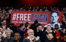 Arsenal fans display banner in support of US journalist detained by Russia