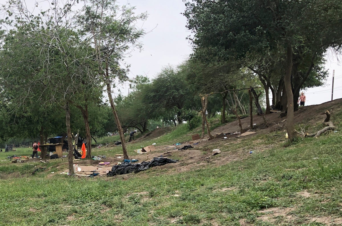 Migrants flee in terror as Mexico camp tents set on fire near Texas border