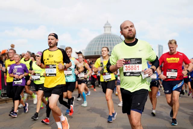 The app allows people to send Belief Boosters to marathon participants (James Manning/PA)