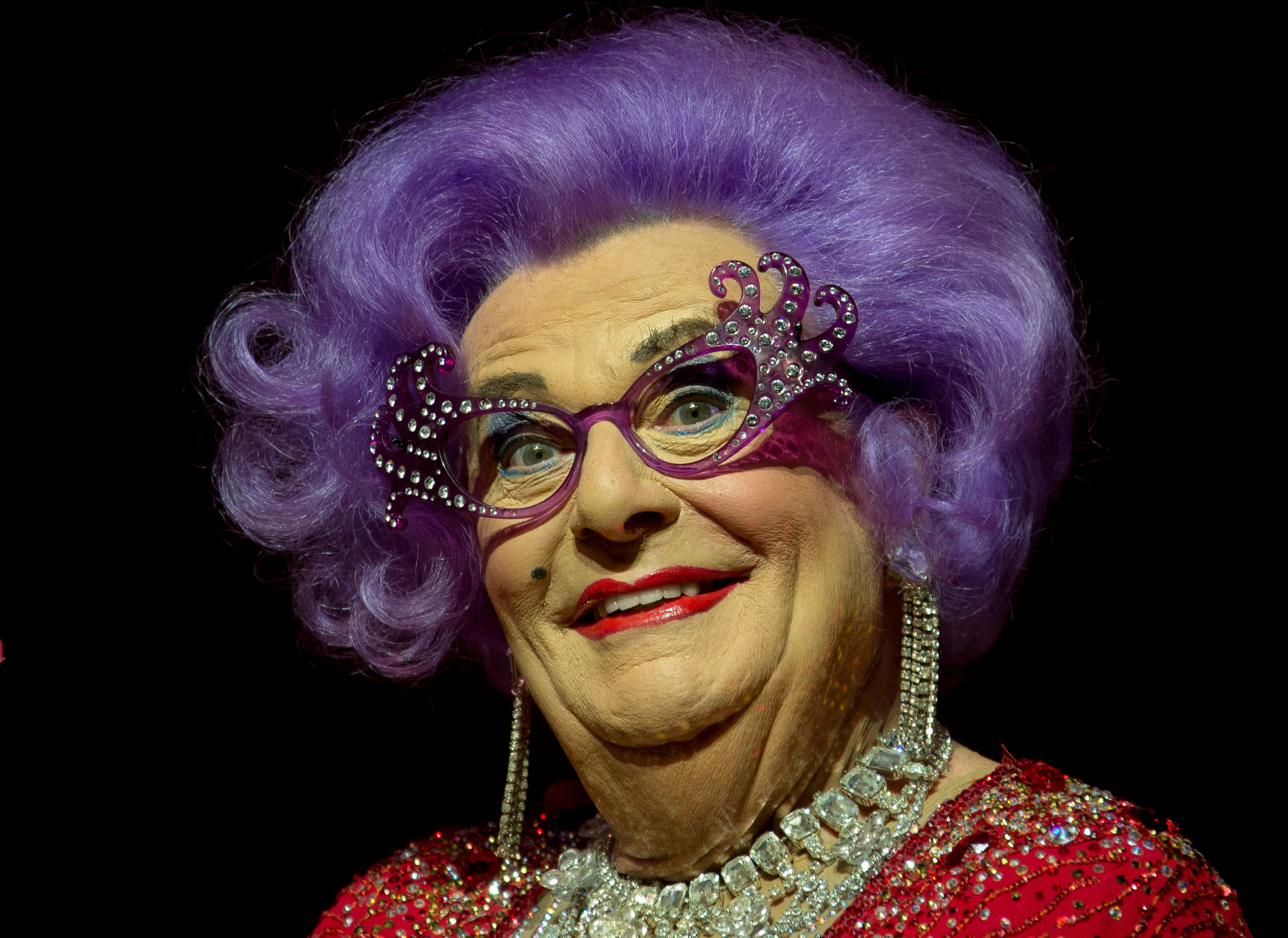 Performing on stage as Dame Edna at the London Palladium in 2013