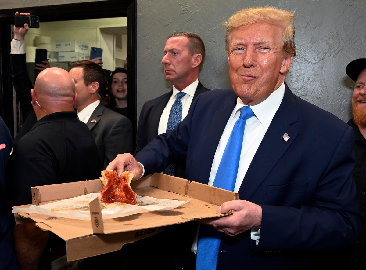 Trump news – live: Trump mocked for ‘disgusting’ pizza offer after slamming Florida in DeSantis attack