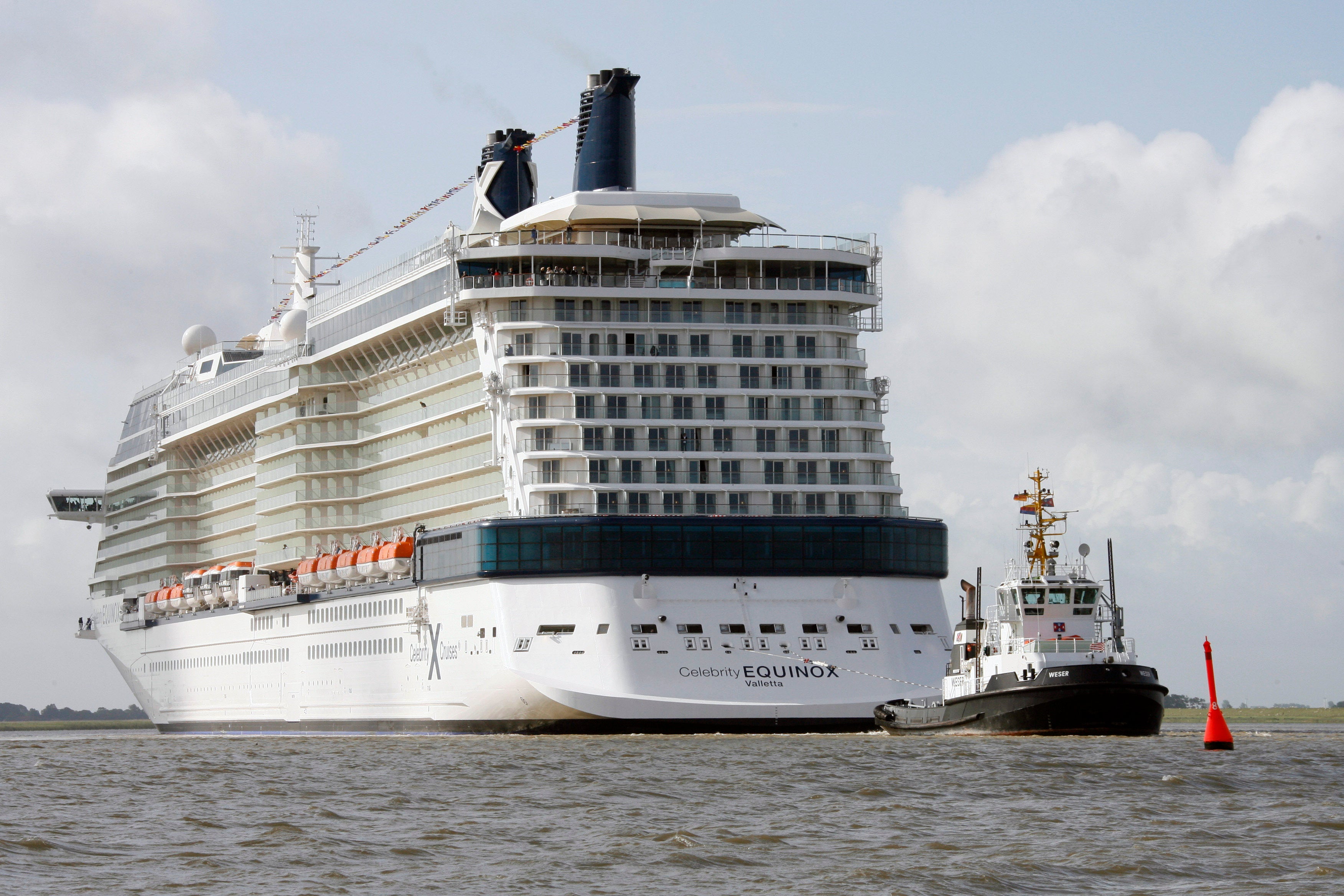 FILE - The cruiser Celebrity Equinox built by the shipyard Meyer in Papenburg, Germany, goes down the river Ems near Gandersum on Saturday, June 20, 2009.