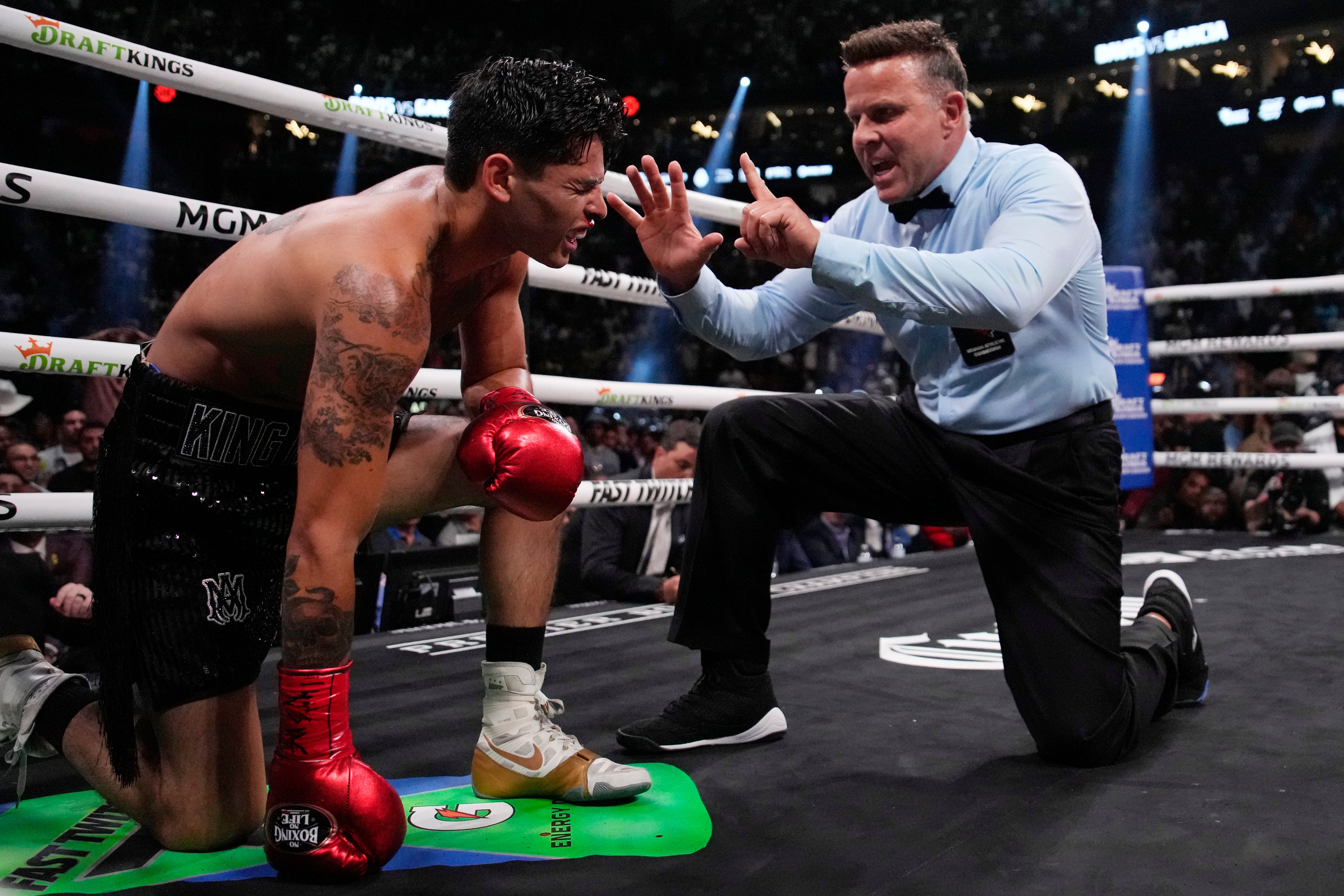 Ryan Garcia was dropped twice by Gervonta Davis, including by a body shot in Round 7