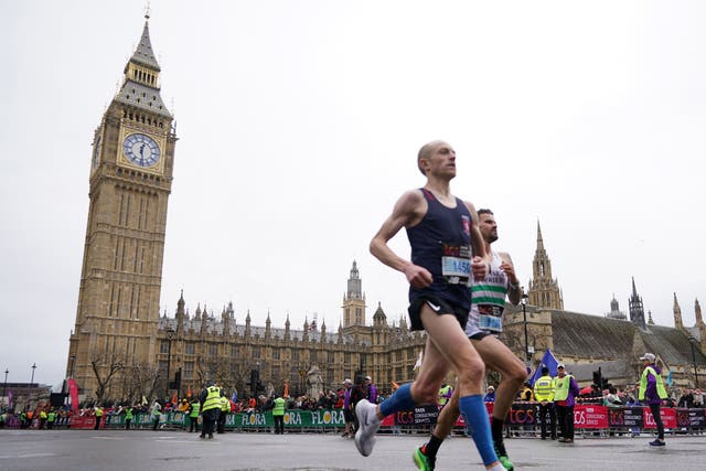 Competitors pass Big Ben and through Westminster (James Manning/PA)