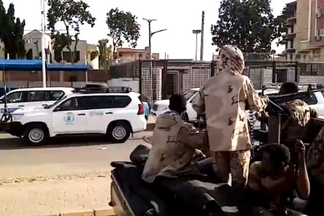 <p>Video shows a convoy leaving Khartoum towards Port Sudan on Sunday as people flee the battle-torn Sudanese capital</p>