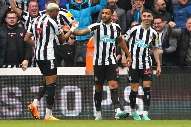 Callum Wilson (centre) celebrates scoring Newcastle’s sixth goal against Tottenham (Owen Humphreys/PA)