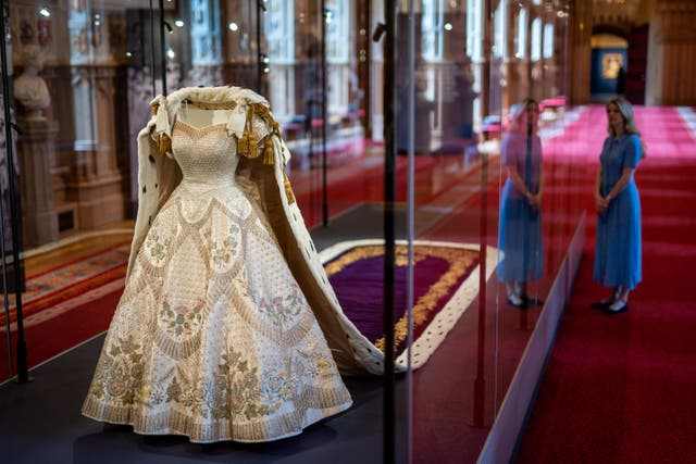Queen Elizabeth II’s coronation dress on display at ‘Platinum Jubilee: The Queen’s Coronation’ at Windsor Castle last year (Aaron Chown/PA)
