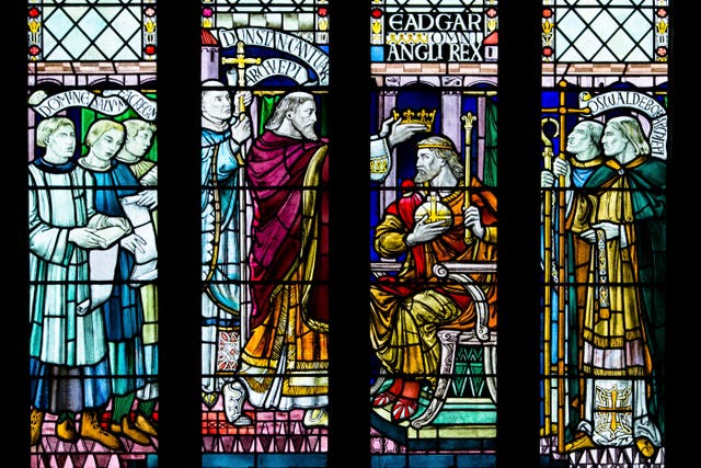 A stained glass window showing the coronation of King Edgar in 973 in Bath Abbey (Alamy/PA)