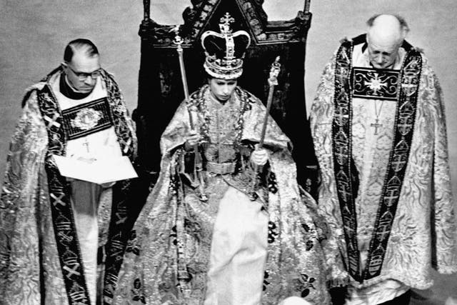 Queen Elizabeth during her coronation in Westminster Abbey (PA)