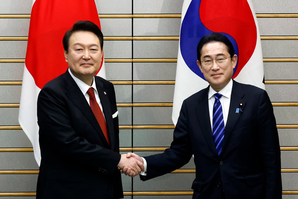 South Korea restores Japan on trade 'white list' | The Independent